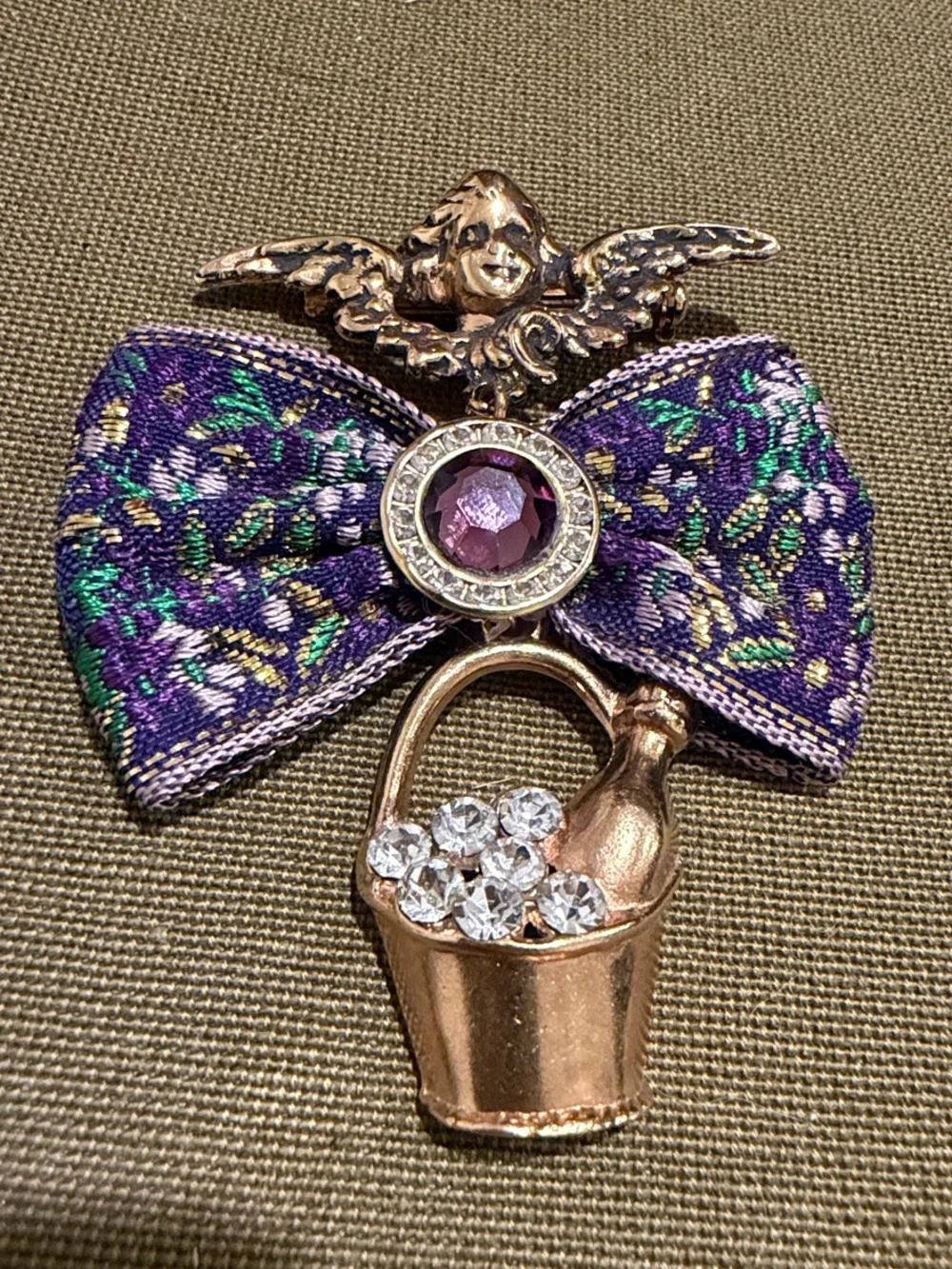 VTG Gold-Tone Cherub Bow Brooch with Purple Gem and Crystal Bucket 3 inches